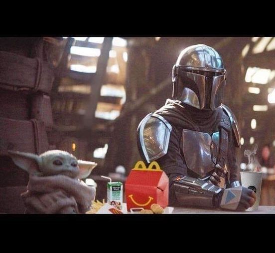This meme is an image of the character Boba Fett from the Star Wars franchise, but instead of his iconic helmet, he's wearing a McDonald's uniform and holding a Big Mac. The image is captioned "I find your lack of fries disturbing".